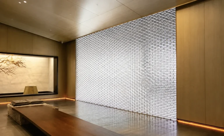 Backlit crystal glass brick feature wall in a hospitality lounge
